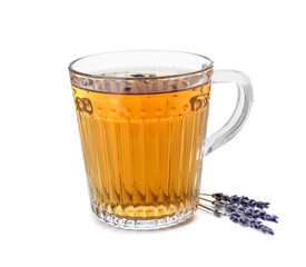 Aromatic lavender tea in glass cup and dry flowers isolated on white