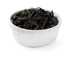 Dry tea leaves in bowl isolated on white