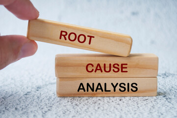 Root Cause Analysis text on wooden blocks. Business and problem analysis concept