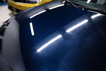 Spectacular before-and-after paint correction reveals swirl removal on the right and a flawless...