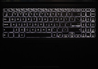 laptop keyboard with nion backlight close-up