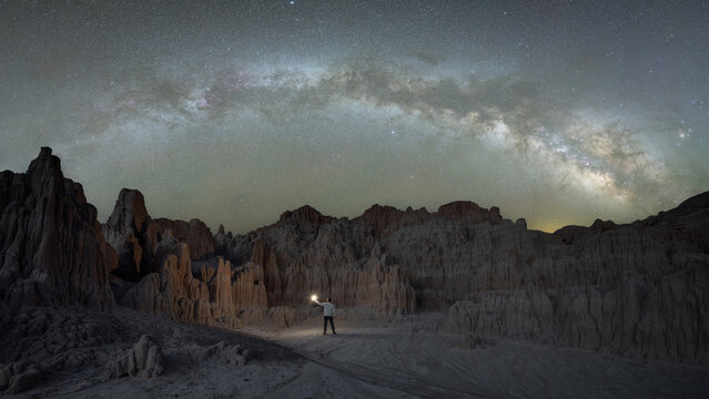 Milky Way Panorama arching over a rock formation in Cathedral Gorge State Park Nevada 