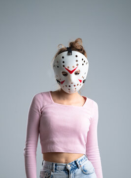 Woman Wearing a Jason Halloween Mask