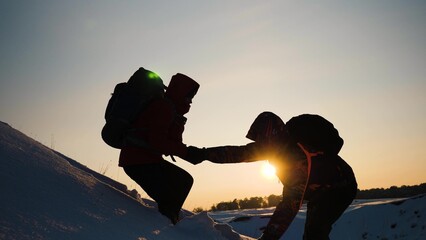 teamwork silhouette. handshake comrades rejoicing victory. shake hands command group mountain hill...