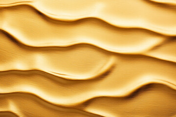 Obraz premium Gold texture flows smoothly with rippling, creating calm and inviting feel