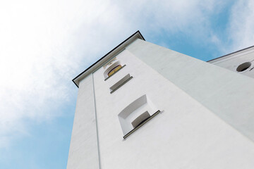Church tower against the blue sky, funeral, wedding, holy sacraments, Catholic church