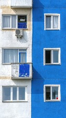 Obraz premium Apartment building facade, contrasting colors, balconies, urban scene, architectural photography
