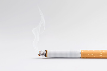 Burning cigarette with smoke on white background. Smoking addiction, health impact concept. World No Tobacco Day