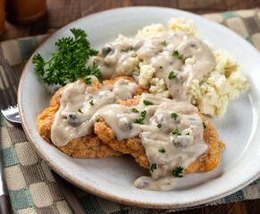 Fried chicken cutlets with mashed potatoes and gravy