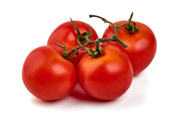 Ripe fresh tomatoes, close-up, isolated on white background.