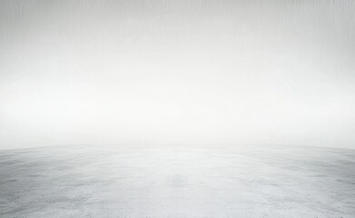 Expansive minimalist space featuring a white wall and gray concrete floor, ideal for product display or backdrop in modern design projects