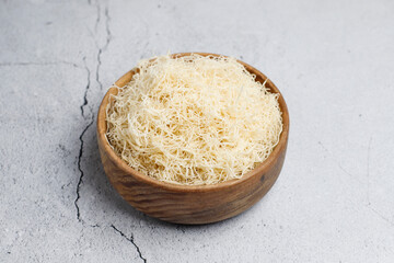 Homemade uncooked kataifi or kadaifi dough.