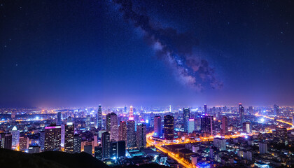 City skyline under shimmering stars in a vibrant mood at night with urban lights