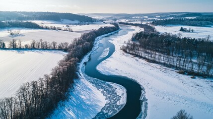 Obraz premium Serene Winter Landscape with Frozen River and Snowy Fields