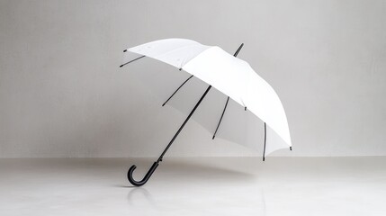 Fototapeta premium White Umbrella Against White Background