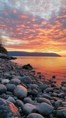 Rocky Coastline Sunset Over Calm Water