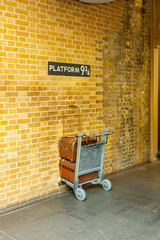 Fototapeta premium Platform 9 and 3 quarters in King's Cross railway station, London, UK