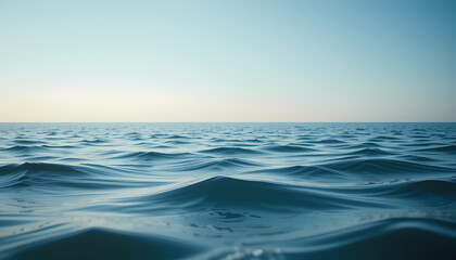 Obraz premium Calm waves on a vast sea under a serene sky. Nature background, ocean backdrop