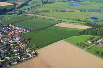 Aerial view on a village in fields, Switzerland, Zurich region