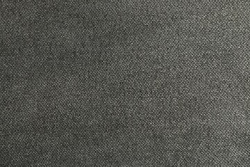 Fototapeta premium Texture of black jeans as background, closeup