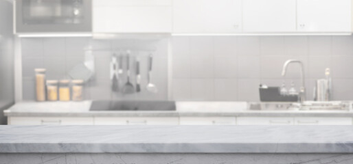 Marble countertop with blurred of a bright, white modern kitchen interior background.not ai generated