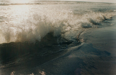Breaking sea waves in the Pacific ocean of Mexico on a sunny day