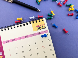 march 2025 calendar marked with red push pins concept of business planning, scheduling, reminder, and time management concept stock photo. 1st march marked on 2025 calendar.