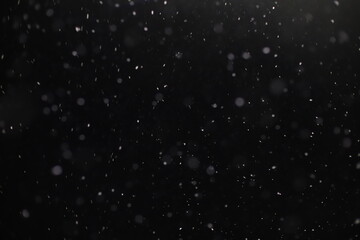 Abstract texture. Falling snow isolated on black background. Layer to overlay and blend snowfall into your photo project.	
