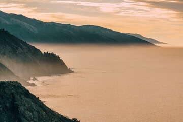 Highway 1 and Big Sur along the Pacific Ocean coast, beautiful landscape and aerial view, sunset, sunrise, fog. Concept, travel, vacation, weekend