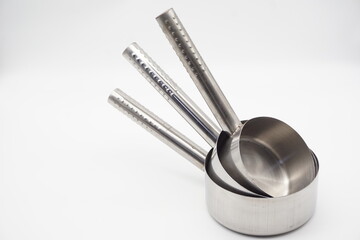 Industrial metal colander, can also be used for household stainless steel water scoop close up on white background