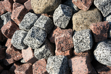 Vibrant assortment of various textured stones in natural sunlight