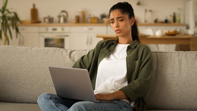 Sad frustrated upset tired stress looser lady laptop work failure customer buyer client shopping online problem trouble at home Indian woman Arabian girl female with smartphone lost disappointed chat