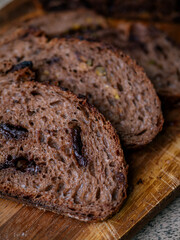 Freshly Baked Artisan Chocolate Sourdough Bread on Wooden Table.