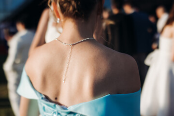 High school graduates dancing on prom, waltz and classical ball slow dance in dresses and suits on...