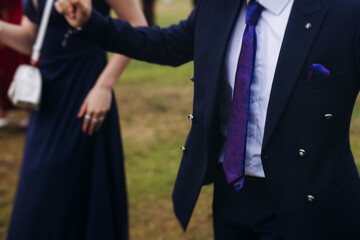 High school graduates dancing on prom, waltz and classical ball slow dance in dresses and suits on...