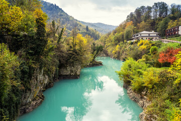 Picturesque autumn view around the banks of the Soca River near Soca Bridge village (Most na Soci),...