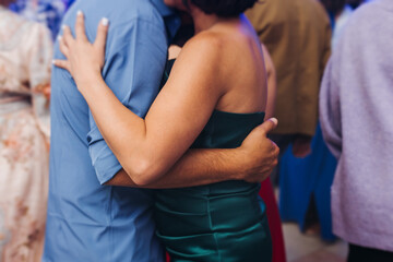 High school graduates dancing on prom, waltz and classical ball slow dance in dresses and suits on...
