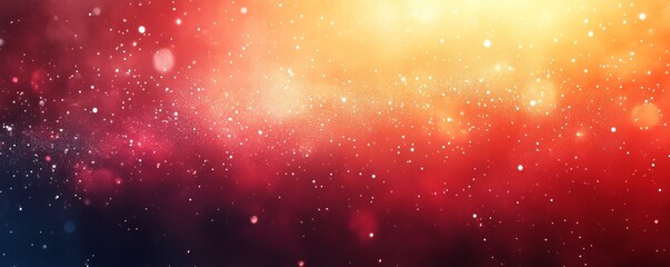 Obraz premium A vibrant abstract background featuring a blend of warm colors with subtle light effects and shimmering particles, creating a celestial atmosphere.