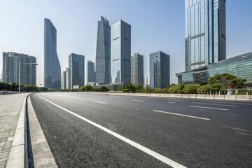 Wide asphalt road stretching through a modern cityscape with sleek skyscrapers and glass towers in the background, city streets, urban development, urban sprawl