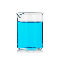 Glass beaker with light blue liquid on mirror surface against white background
