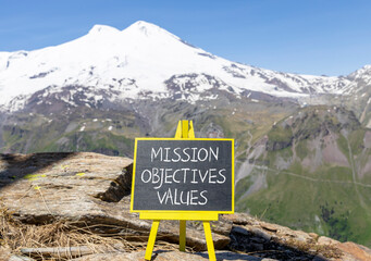 Mission objectives values symbol. Concept words Mission Objectives Values on beautiful black...