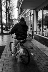 Guy Riding a Bike in the City