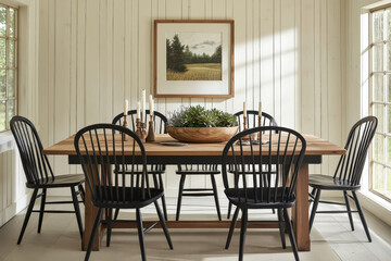 Modern farmhouse dining room with wooden table and black chairs
