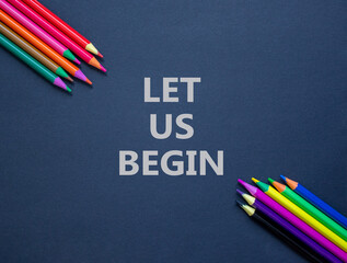 Let us begin symbol. Concept words Let us begin on beautiful grey paper. Beautiful grey paper...
