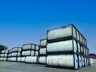 ISO tank containers stacked neatly in the depot stacking area