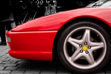Side view of shiny red sports car