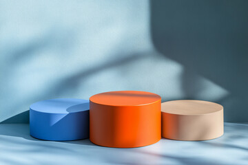 three product podiums blue and and orange colors soft shadows abstarct geometry shapes 