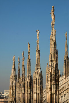 Row of statues on the spires of Milan Cathedral