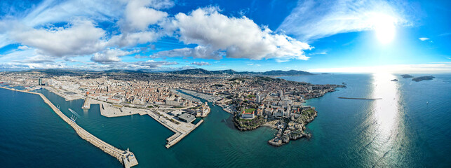 Aerial view above Marseille and its beautiful urban coastline and Marina on the Mediterranean