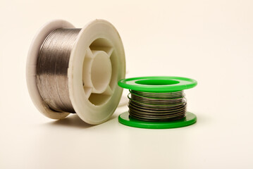 Coils with solder. Solder for electronics. Tin-lead solder.
